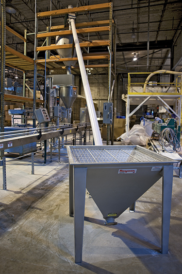 APCO Packaging Moves Perlite in Low Headroom Area with Flexible Screw Conveyor